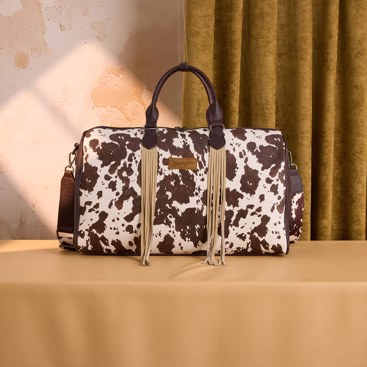 Wrangler Fringe Cowprint Crossbody Duffle