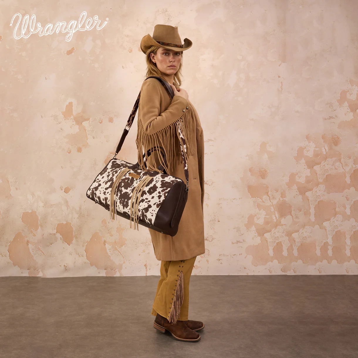Wrangler Fringe Cowprint Crossbody Duffle