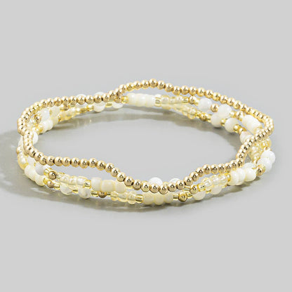 Shell Bead And Gold Stretch Layered Bracelet Set