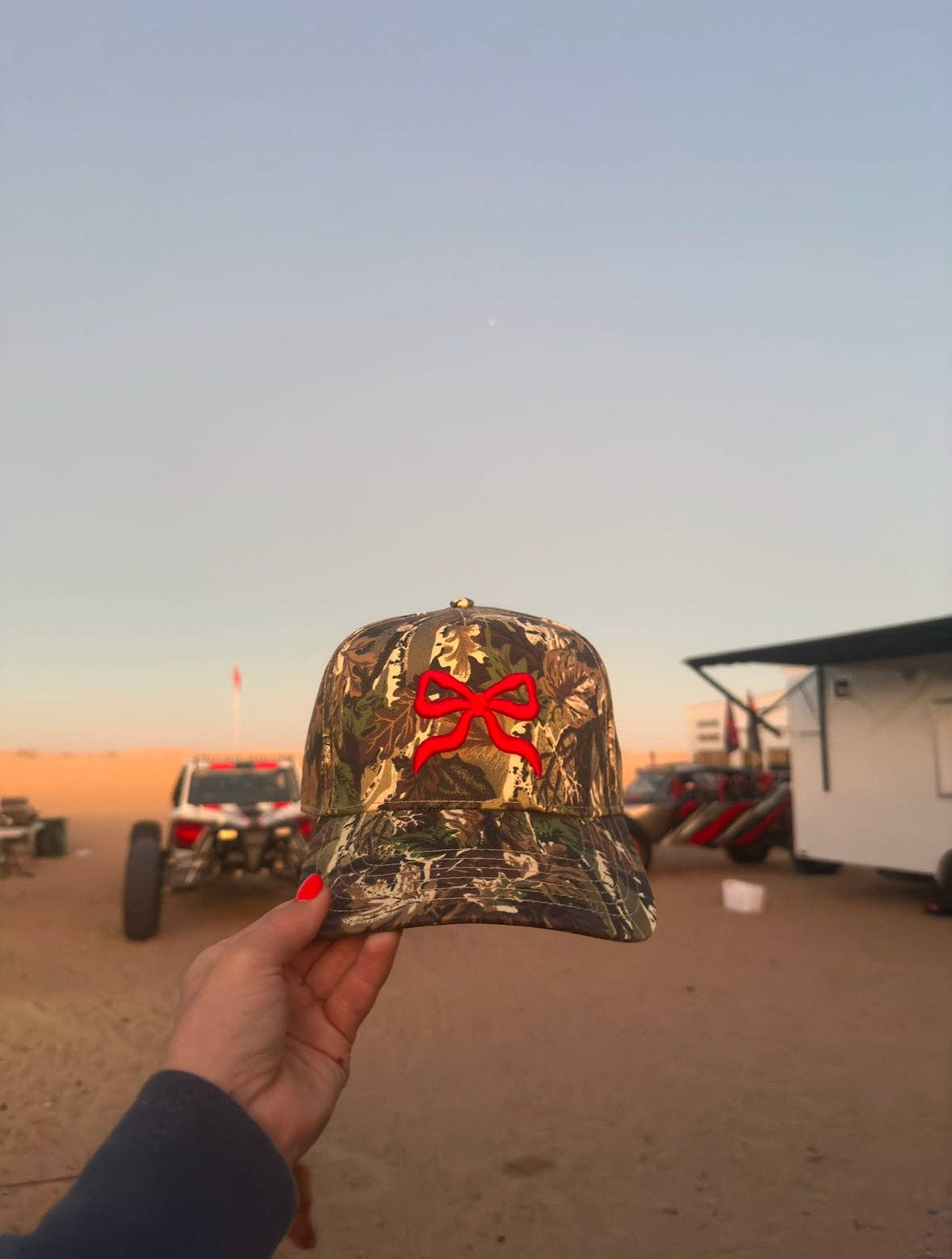 Bow Embroidered Camo Trucker Hat