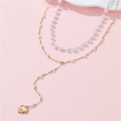 Layered Pearl Y-Necklace with Heart Pendant