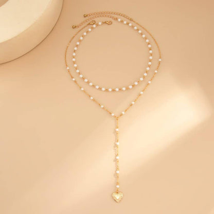 Layered Pearl Y-Necklace with Heart Pendant