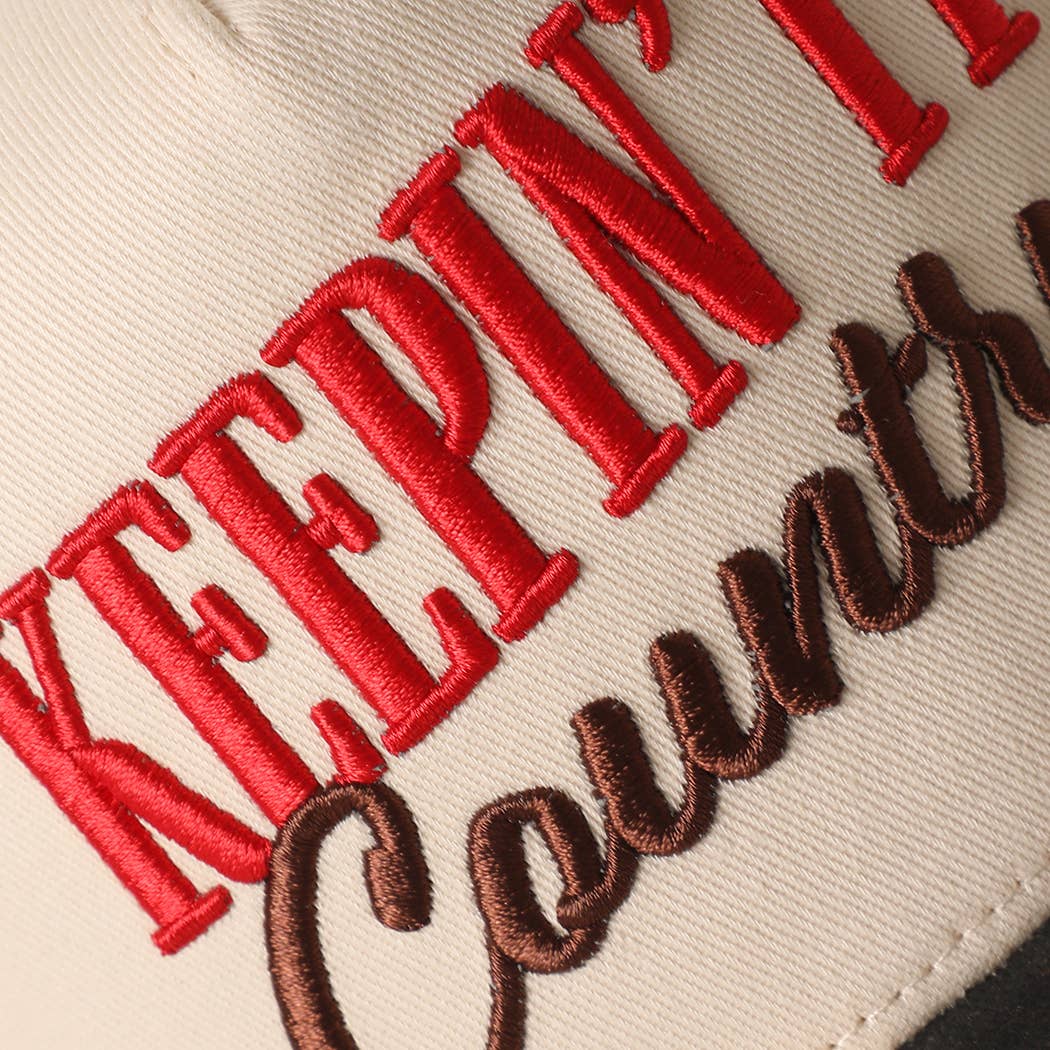 Keepin' It Country Embroidered Cow Print Brim Trucker Hat